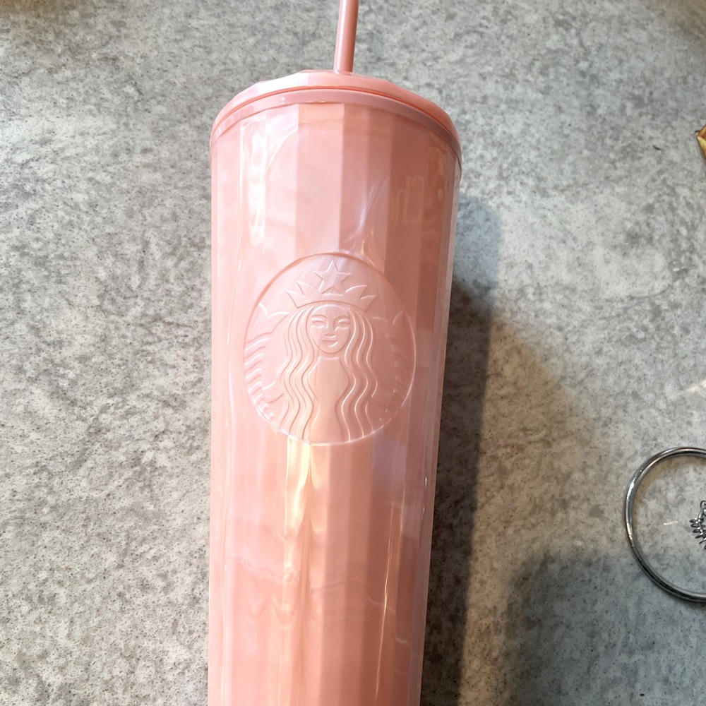 Pink cylinder Starbucks tumbler
